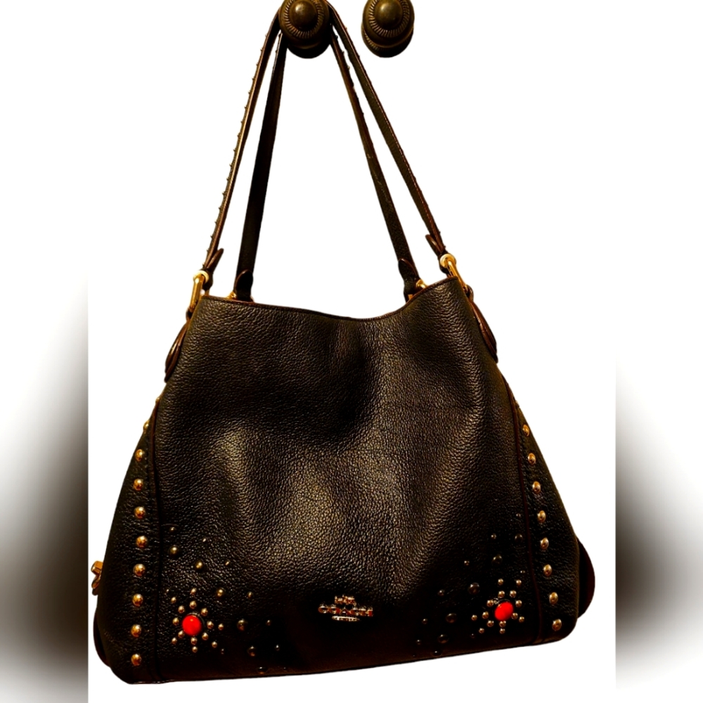 - COACH black pebble leather with red and silver bullets. Hobo 3 huge pock…